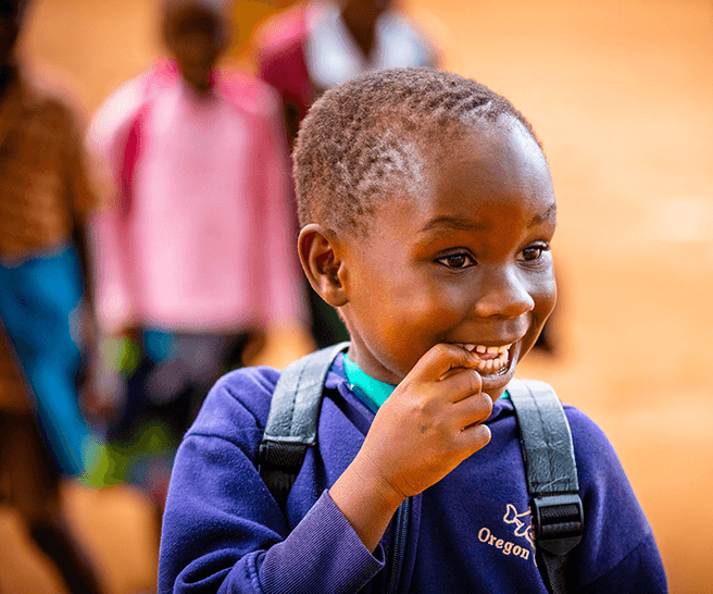 boy going to school in malawi